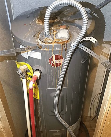 hot water heater leaking from side panel|Water Heater Leaking From Side Pipe: Causes, Solutions, And。